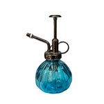 Blue glass mister for plant interior and exterior for elegant decor 