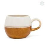 Introducing the Ball Mug - 2 Tone by MyHomeDecor.ca. This rustic stoneware mug features a rounded shape with a small handle on the right. The design showcases a stylish two-tone color scheme, transitioning from a white top half to a speckled brown bottom half, complemented by a "Best Seller" label in the top right corner.