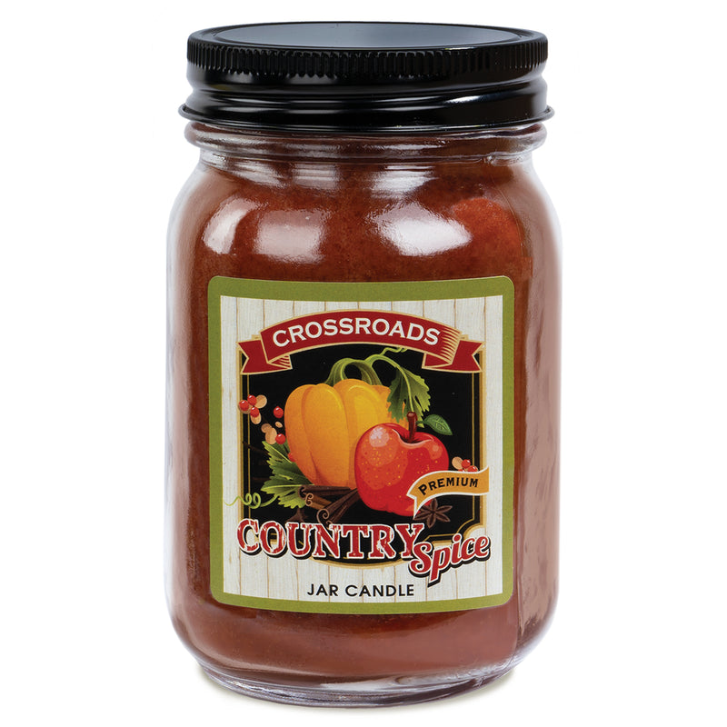 A glass jar candle with a black lid. The label reads "MyHomeDecor.ca Country Classics Candle Jar - Country Spice" and features colorful illustrations of pumpkins and apples set against a wooden background, evoking the charm of vintage-style candles. The candle wax is brown.